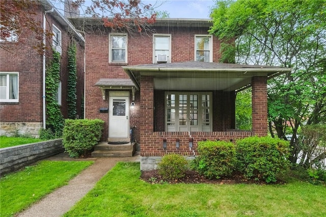 3855 Hiawatha St, Brighton Heights, PA 15212 - view of front of property featuring brick siding and a front lawn