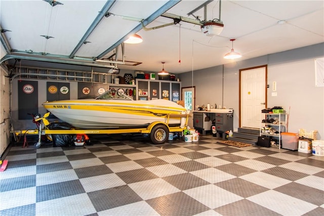 101 Timber Ct, Franklin Twp But, PA 16052 - garage featuring a garage door opener