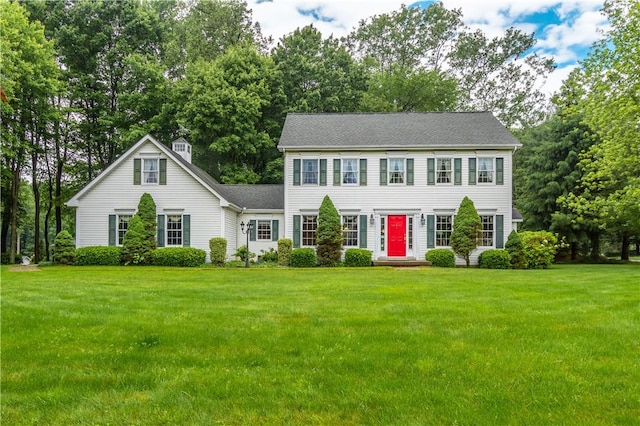 101 Timber Ct, Franklin Twp But, PA 16052 - colonial inspired home with a front yard and view of scattered trees