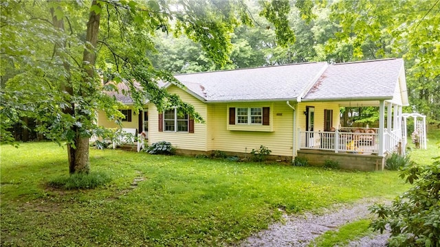 287 Hungarian Rd, Slippery Rock Twp But, PA 16057 - view of front of home with a porch, a front yard, and a shingled roof