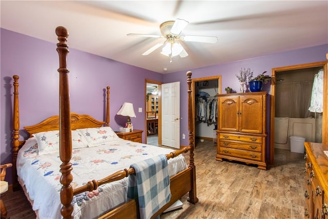287 Hungarian Rd, Slippery Rock Twp But, PA 16057 - bedroom featuring light wood-style floors, a walk in closet, a closet, and a ceiling fan