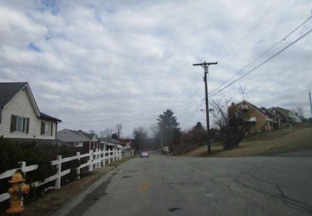 1860 Ohio Ave, West Mifflin, PA 15122 - view of asphalt street featuring a residential view
