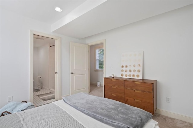 2700 Sumner St, South Side, PA 15203 - bedroom with light carpet, baseboards, and ensuite bath