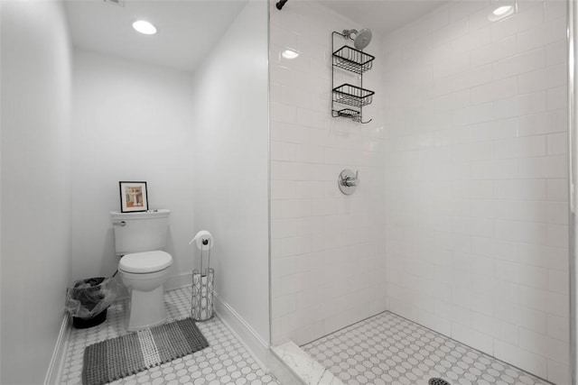 2700 Sumner St, South Side, PA 15203 - bathroom with a tile shower, toilet, baseboards, tile patterned flooring, and recessed lighting