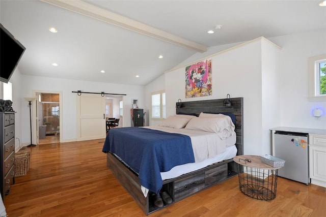 2700 Sumner St, South Side, PA 15203 - bedroom featuring refrigerator, a barn door, light wood-type flooring, and recessed lighting