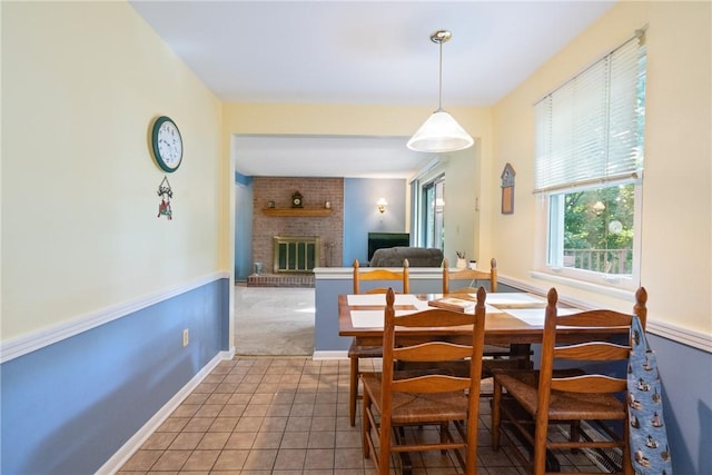 152 N Jamestown Rd, Moon/Crescent Twp, PA 15108 - dining space featuring a fireplace and tile patterned floors