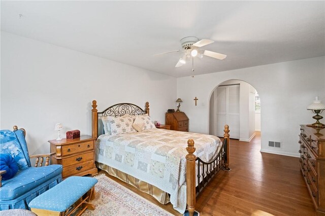 152 N Jamestown Rd, Moon/Crescent Twp, PA 15108 - bedroom featuring arched walkways, wood finished floors, and ceiling fan
