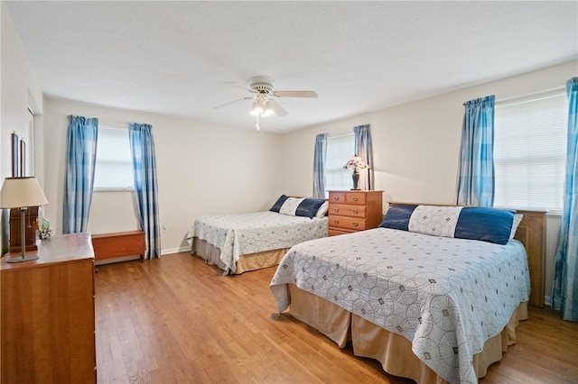 152 N Jamestown Rd, Moon/Crescent Twp, PA 15108 - bedroom featuring multiple windows, light wood-style flooring, and ceiling fan