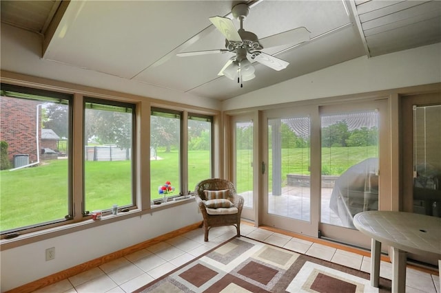 199 Rustic Dr, North Huntingdon, PA 15642 - sunroom with tile patterned flooring, healthy amount of natural light, vaulted ceiling, and baseboards