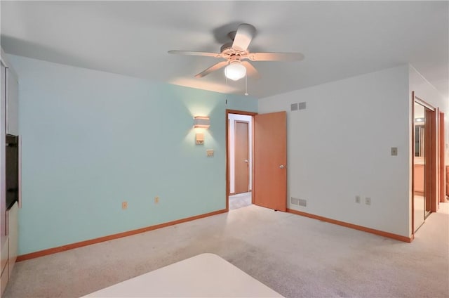 199 Rustic Dr, North Huntingdon, PA 15642 - unfurnished bedroom featuring light colored carpet, baseboards, and ceiling fan