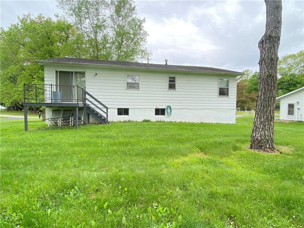 9 Oakview Dr, Hempfield Twp Mer, PA 16125 - rear view of house featuring a deck, a yard, and stairway