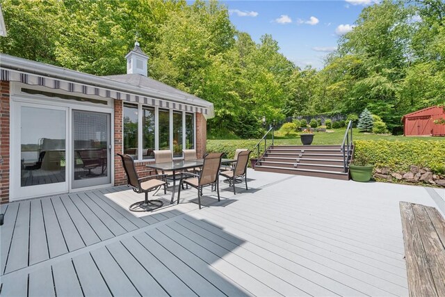 1199 Chestnut St, Indiana Boro Ind, PA 15701 - deck featuring outdoor dining space, view of scattered trees, and a storage unit