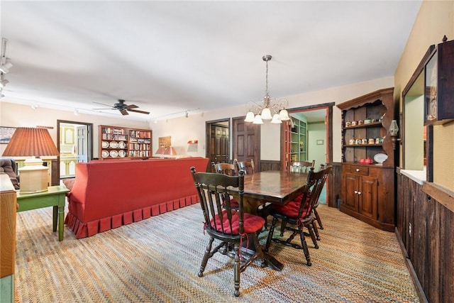 1199 Chestnut St, Indiana Boro Ind, PA 15701 - dining space with light colored carpet, track lighting, a chandelier, and ceiling fan