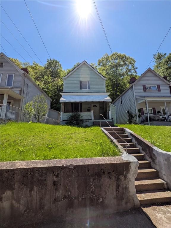 518 Glenn St, Wilmerding, PA 15148 - view of front of house with a porch