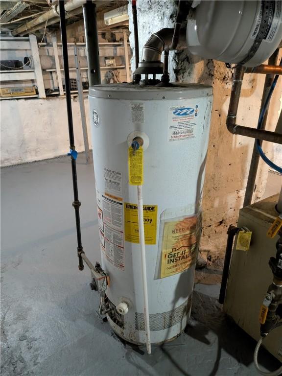 518 Glenn St, Wilmerding, PA 15148 - utility room featuring water heater