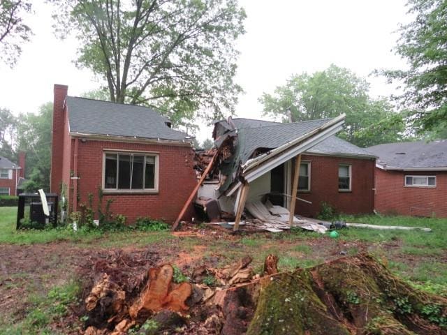 1845 Atkinson Pl, Wilkinsburg, PA 15235 - rear view of house with brick siding and a chimney
