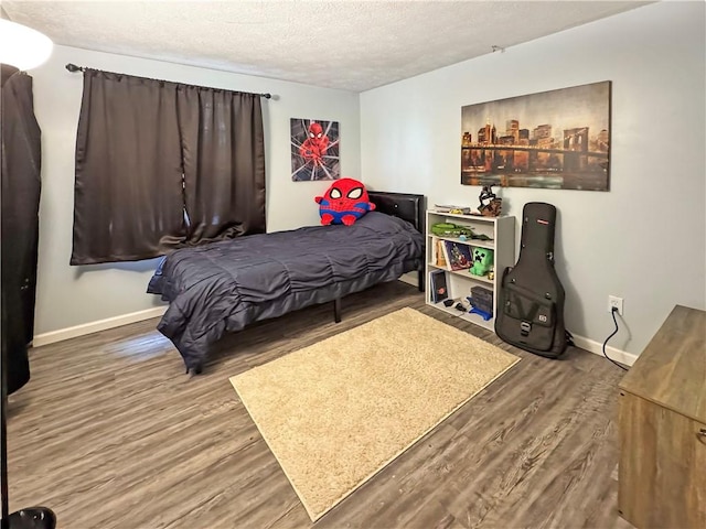 108 Bucks Rd, Cranberry Twp, PA 16066 - bedroom with wood finished floors, a textured ceiling, and baseboards