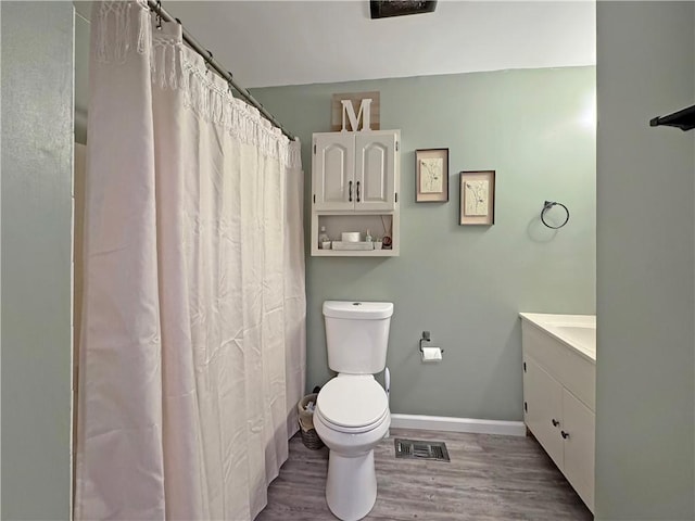 108 Bucks Rd, Cranberry Twp, PA 16066 - full bathroom with toilet, vanity, wood finished floors, baseboards, and a shower with curtain