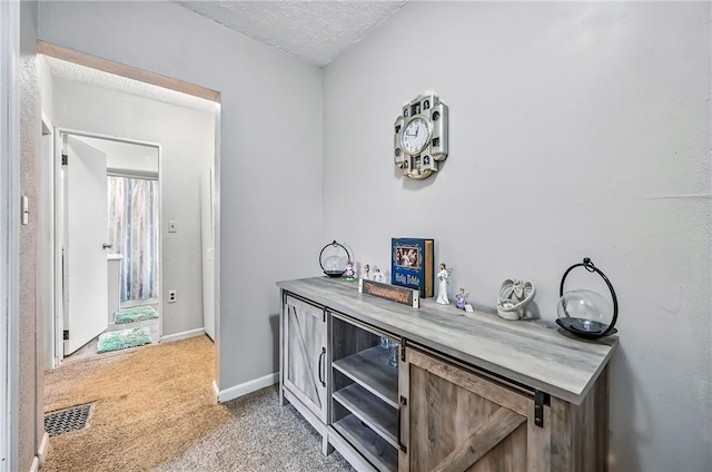 283 S 5th St, Sharpsville, PA 16150 - bar with light carpet, a textured ceiling, and baseboards