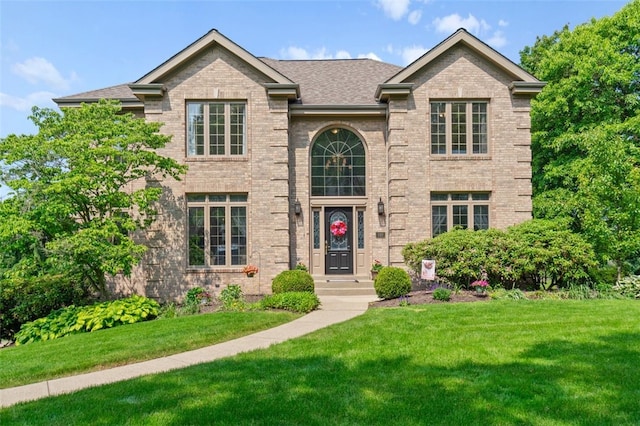 112 Beaver Creek Ct, Sewickley, PA 15143 - view of front of home featuring brick siding, a front lawn, and roof with shingles