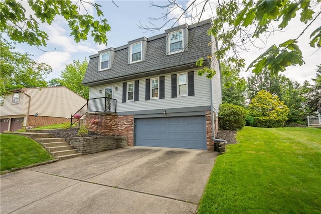 2609 Fox Chase Ct, South Fayette, PA 15017 - view of front facade featuring a garage, roof with shingles, a front lawn, concrete driveway, and mansard roof
