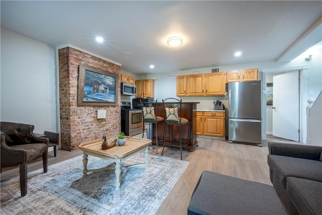 1701 Meadville St, Fineview, PA 15214 - living area featuring light wood-style floors and recessed lighting