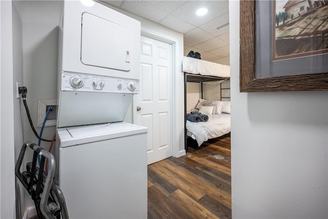 1701 Meadville St, Fineview, PA 15214 - laundry room with stacked washer / drying machine and dark wood-style flooring
