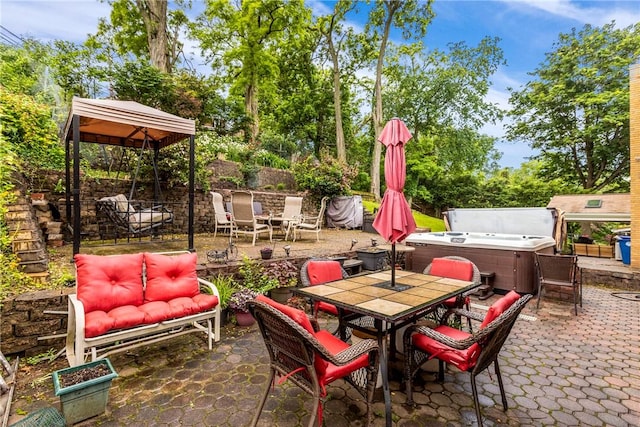 2920 Roland Ave, Baldwin Boro, PA 15227 - view of patio with a hot tub, outdoor dining space, and view of scattered trees