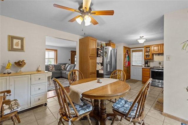 2920 Roland Ave, Baldwin Boro, PA 15227 - dining area with light tile patterned floors and ceiling fan