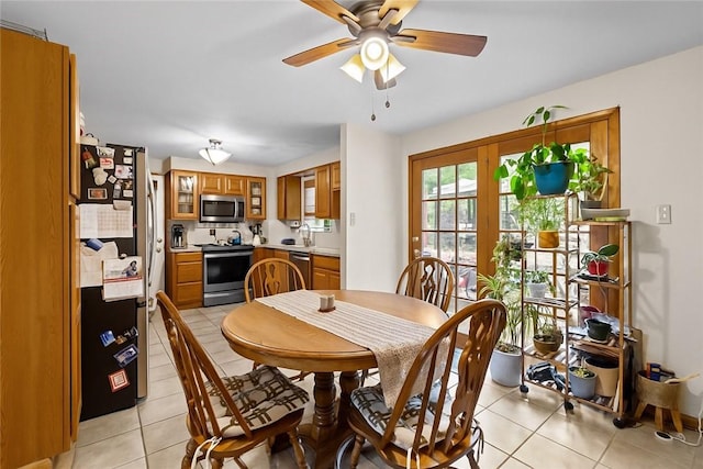 2920 Roland Ave, Baldwin Boro, PA 15227 - dining room with light tile patterned flooring and ceiling fan