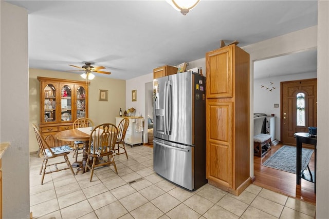 2920 Roland Ave, Baldwin Boro, PA 15227 - kitchen with stainless steel fridge, light tile patterned flooring, and a ceiling fan