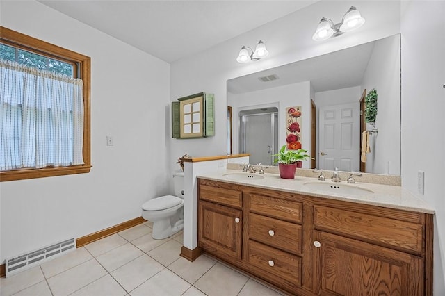 1408 Fernledge Dr, Shaler, PA 15101 - full bath featuring double vanity, a stall shower, toilet, baseboards, and tile patterned flooring