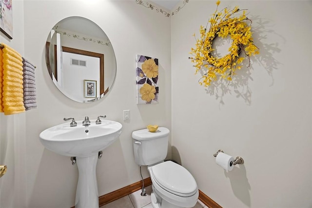 1408 Fernledge Dr, Shaler, PA 15101 - half bathroom with toilet, baseboards, and tile patterned flooring