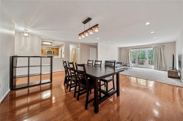 4677 Bayard St Unit 201, Oakland, PA 15213 - dining space with wood finished floors, baseboards, and recessed lighting