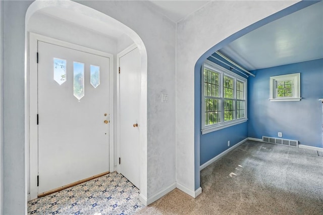1060 S Hermitage Rd, Hermitage, PA 16148 - carpeted foyer featuring arched walkways and baseboards