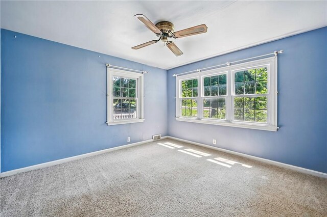 1060 S Hermitage Rd, Hermitage, PA 16148 - empty room with carpet flooring, a ceiling fan, and baseboards