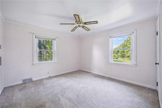 1060 S Hermitage Rd, Hermitage, PA 16148 - carpeted spare room featuring healthy amount of natural light, crown molding, a ceiling fan, and baseboards