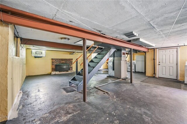 1060 S Hermitage Rd, Hermitage, PA 16148 - basement with freestanding refrigerator, stairs, and washer / clothes dryer