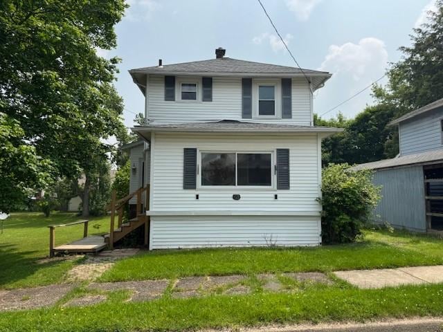 521 Mcclure, Sharon, PA 16146 - back of house featuring a lawn