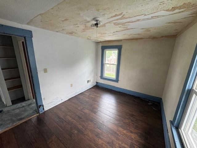 521 Mcclure, Sharon, PA 16146 - spare room with wood-type flooring and baseboards