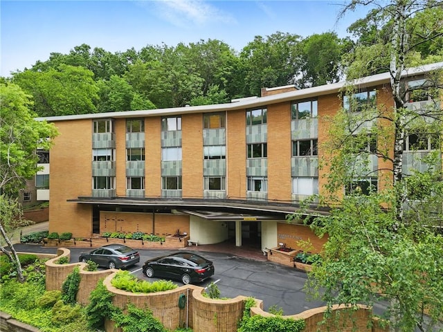 5048 5th Ave Unit 101, Shadyside, PA 15232 - view of apartment building / complex with driveway