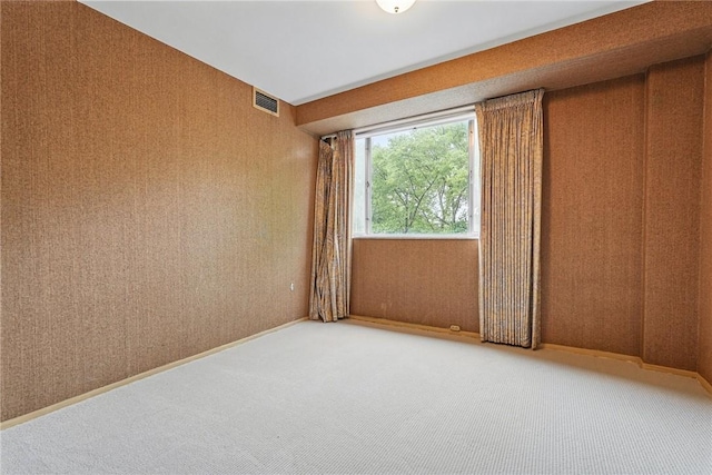 5048 5th Ave Unit 101, Shadyside, PA 15232 - spare room featuring carpet floors and wallpapered walls