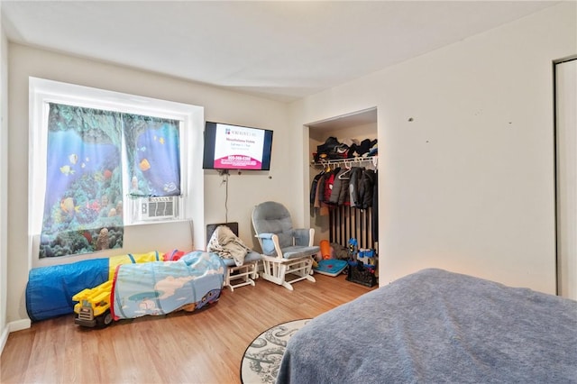 1332 Diana St, Troy Hill, PA 15212 - bedroom with wood finished floors and a closet