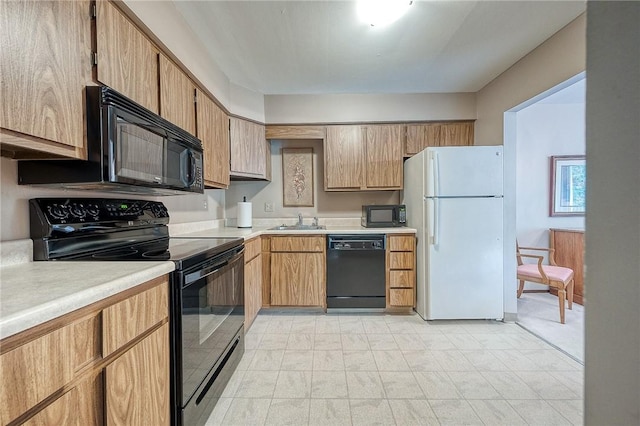 551 Sloop Dr Unit 61, Mccandless, PA 15237 - kitchen with black appliances, a sink, and light countertops