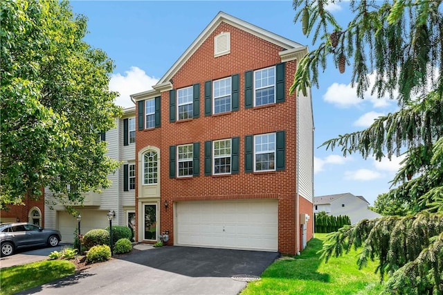 2000 Michael Dr, Baldwin Boro, PA 15227 - view of property with driveway, an attached garage, and brick siding