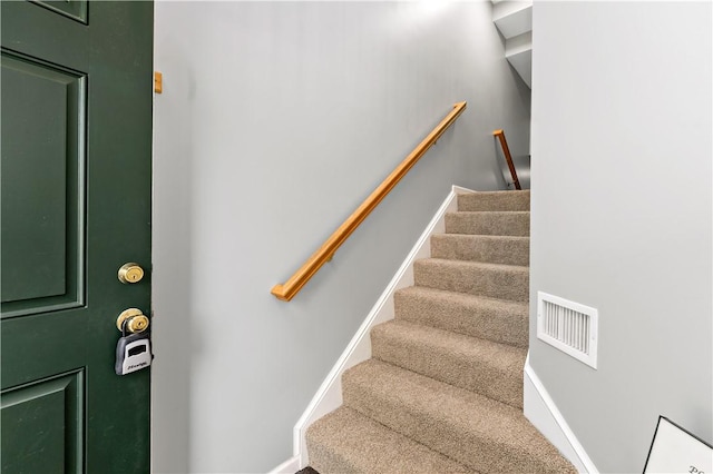 2000 Michael Dr, Baldwin Boro, PA 15227 - staircase featuring baseboards