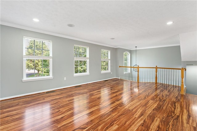2000 Michael Dr, Baldwin Boro, PA 15227 - unfurnished room featuring wood finished floors, ornamental molding, recessed lighting, and baseboards