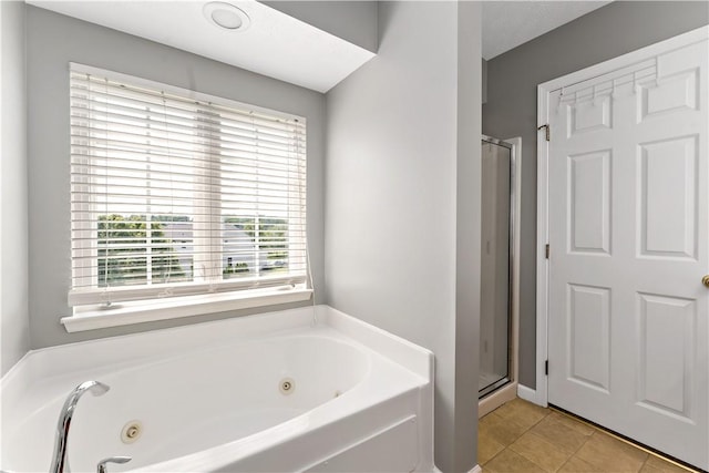 2000 Michael Dr, Baldwin Boro, PA 15227 - full bath with a jetted tub, a shower stall, and tile patterned floors