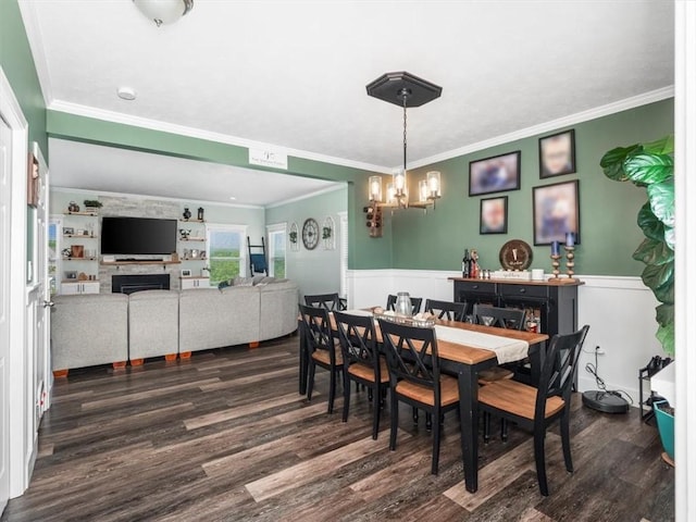 117 Dutch Creek Dr, Jackson Twp But, PA 16063 - dining room featuring dark wood finished floors, a chandelier, wainscoting, ornamental molding, and a fireplace