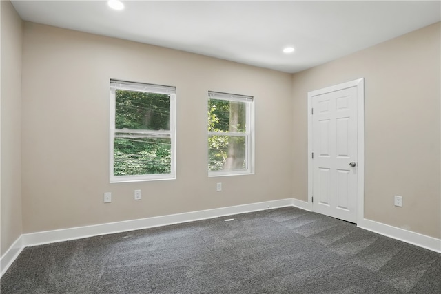 635 9th St, Freedom, PA 15042 - spare room with dark colored carpet, recessed lighting, and baseboards